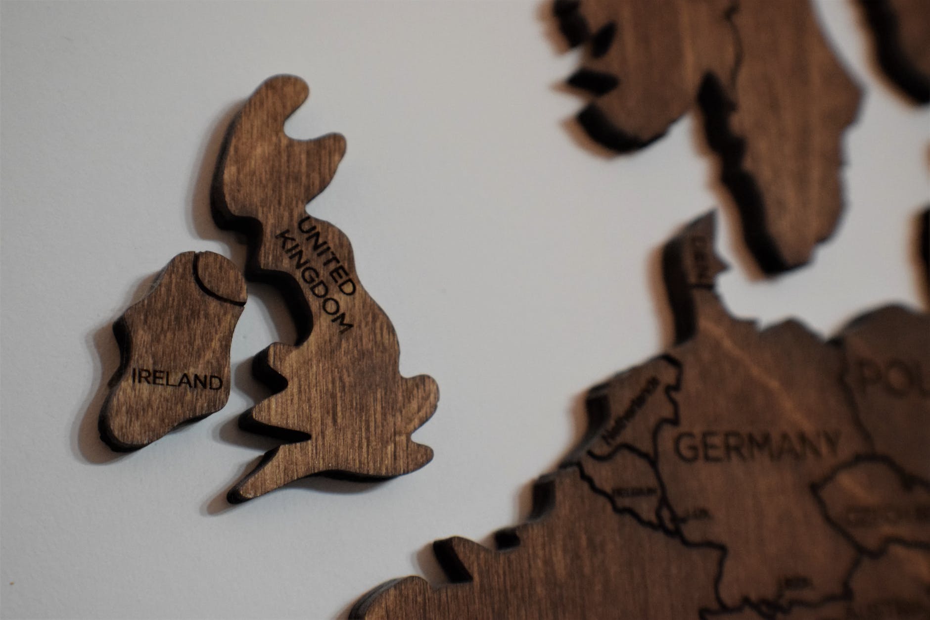 brown wooden jigsaw puzzle piece